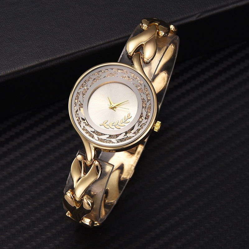 Fashion Leaf Design Hollow Stainless Steel Strap Ladies Dress Women Quartz Watch