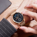 SKMEI 9182 Business Style Circular Mirror Mesh Steel Strap Week Date Display Men Watch Quartz Watch