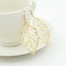 Women'S Earrings Hot Fashion Jewelry Hollow Metal Leaves Dangling Long Stat
