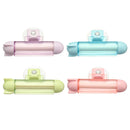 ABS Rolling Squeezer Toothpaste Dispenser Tube Partner Sucker Hanging Holder