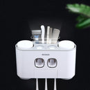 Ecoco Bathroom Automatic Toothpaste Dispenser Toothpaste Squeezer Wall Paste Mounted Toothbrush Holder Bathroom Accessories Set
