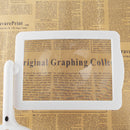 White Desktop Magnifier Plastic Magnifying Glass Standing Style With 2 LED Light