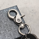 Gun Black Skull Pattern Keychain Feather Pendant Key Ring Halloween Gift for Unisex