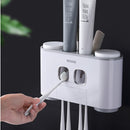 Ecoco Bathroom Automatic Toothpaste Dispenser Toothpaste Squeezer Wall Paste Mounted Toothbrush Holder Bathroom Accessories Set