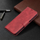 For Samsung Galaxy A12 Retro Lambskin Texture Pure Color Horizontal Flip PU Leather Case with Holder & Card Slots & Wallet & Lanyard(Red)