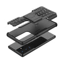 For Samsung Galaxy S21 Ultra 5G Tire Texture Shockproof TPU+PC Protective Case with Holder(Black)