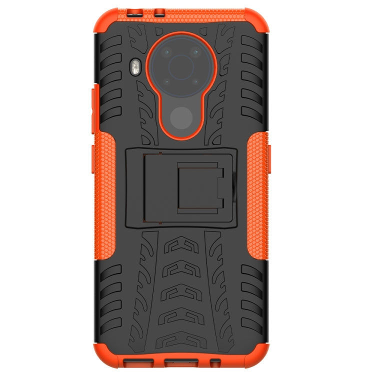 For Nokia 3.4 / 5.4 Tire Texture Shockproof TPU+PC Protective Case with Holder(Orange)