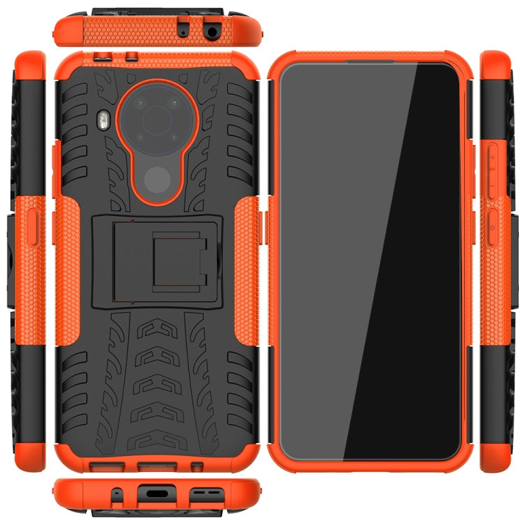For Nokia 3.4 / 5.4 Tire Texture Shockproof TPU+PC Protective Case with Holder(Orange)