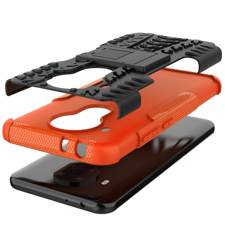For Nokia 3.4 / 5.4 Tire Texture Shockproof TPU+PC Protective Case with Holder(Orange)