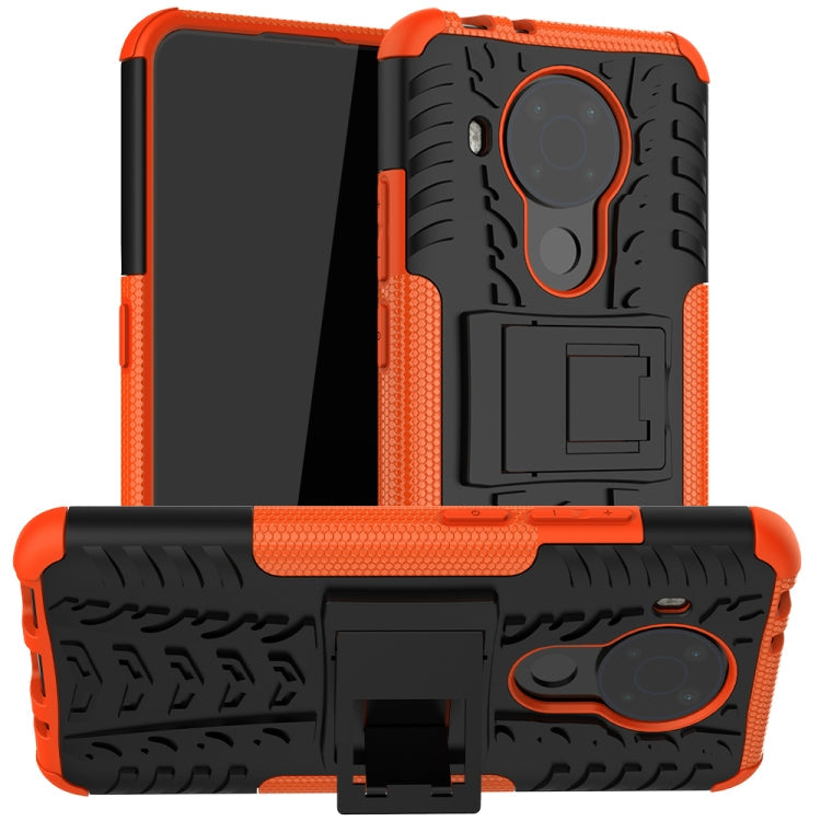 For Nokia 3.4 / 5.4 Tire Texture Shockproof TPU+PC Protective Case with Holder(Orange)