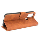 For Motorola Moto G30 / G10 Solid Color Skin Feel Magnetic Buckle Horizontal Flip Calf Texture PU Leather Case with Holder & Card Slots & Wallet(Brown)