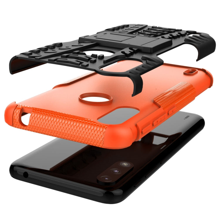 For Motorola Moto E7 Power Tire Texture Shockproof TPU+PC Protective Case with Holder(Orange)
