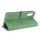 For Samsung Galaxy S21 FE Solid Color Skin Feel Magnetic Buckle Horizontal Flip Calf Texture PU Leather Case with Holder & Card Slots & Wallet(Green)