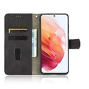 For Samsung Galaxy S21 FE Solid Color Skin Feel Magnetic Buckle Horizontal Flip Calf Texture PU Leather Case with Holder & Card Slots & Wallet(Black)
