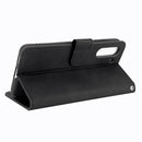 For Samsung Galaxy S21 FE Solid Color Skin Feel Magnetic Buckle Horizontal Flip Calf Texture PU Leather Case with Holder & Card Slots & Wallet(Black)
