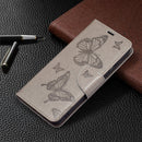 For Samsung Galaxy S21 FE Embossing Two Butterflies Pattern Horizontal Flip PU Leather Case with Holder & Card Slot & Wallet & Lanyard(Grey)