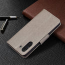 For Samsung Galaxy S21 FE Embossing Two Butterflies Pattern Horizontal Flip PU Leather Case with Holder & Card Slot & Wallet & Lanyard(Grey)