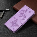 For Samsung Galaxy S21 FE Embossing Two Butterflies Pattern Horizontal Flip PU Leather Case with Holder & Card Slot & Wallet & Lanyard(Purple)