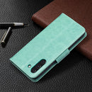For Samsung Galaxy S21 FE Embossing Two Butterflies Pattern Horizontal Flip PU Leather Case with Holder & Card Slot & Wallet & Lanyard(Green)