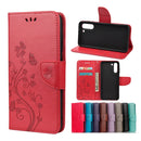 For Samsung Galaxy S21 FE Butterfly Flower Pattern Horizontal Flip Leather Case with Holder & Card Slots & Wallet(Red)