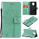 For Nokia G10 Tree & Cat Pattern Pressed Printing Horizontal Flip PU Leather Case with Holder & Card Slots & Wallet & Lanyard(Green)