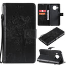 For Nokia X20 Tree & Cat Pattern Pressed Printing Horizontal Flip PU Leather Case with Holder & Card Slots & Wallet & Lanyard(Black)