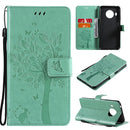 For Nokia X20 Tree & Cat Pattern Pressed Printing Horizontal Flip PU Leather Case with Holder & Card Slots & Wallet & Lanyard(Green)