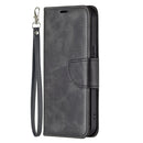 For iPhone 13 Retro Lambskin Texture Pure Color Horizontal Flip PU Leather Case, with Holder & Card Slots & Wallet & Lanyard(Black)