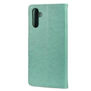 For Samsung Galaxy A13 5G Butterfly Flower Pattern Horizontal Flip Leather Phone Case with Card Slot & Holder(Green)
