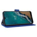 For Nokia G50 Solid Color Skin Feel Magnetic Buckle Horizontal Flip Calf Texture PU Phone Case(Blue)