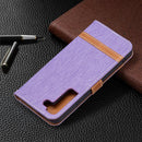 For Samsung Galaxy S22 5G Color Matching Denim Texture Leather Case with Holder & Card Slots & Wallet & Lanyard(Purple)