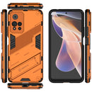 For Xiaomi Redmi Note 11 Pro / Note 11 Pro+ Punk Armor 2 in 1 PC + TPU Shockproof Phone Case with Invisible Holder(Orange)