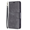For Samsung Galaxy S22+ 5G Retro Lambskin Texture Pure Color Horizontal Flip Leather Phone Case with Holder & Card Slots & Wallet & Lanyard(Black)