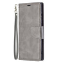 For Samsung Galaxy S22 Ultra 5G Retro Lambskin Texture Pure Color Horizontal Flip Leather Phone Case with Holder & Card Slots & Wallet & Lanyard(Grey)