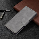 For Samsung Galaxy S22 Ultra 5G Retro Lambskin Texture Pure Color Horizontal Flip Leather Phone Case with Holder & Card Slots & Wallet & Lanyard(Grey)