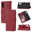 For Samsung Galaxy A13 5G Embossed Happy Cat Pattern Leather Phone Case(Red)