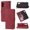 For Samsung Galaxy A13 5G Embossed Happy Cat Pattern Leather Phone Case(Red)