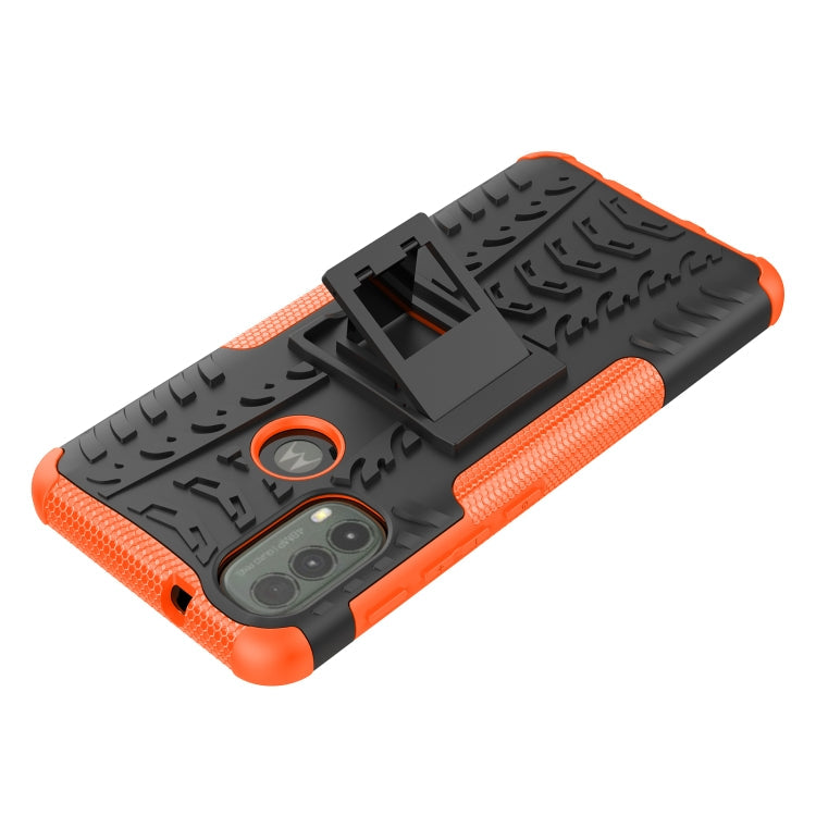 For Motorola Moto E40 Tire Texture TPU + PC Phone Case with Holder(Orange)