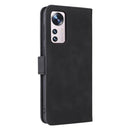 For Xiaomi 12 5G Skin Feel Magnetic Buckle Calf Texture PU Phone Case(Black)