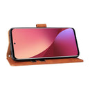 For Xiaomi 12 5G Skin Feel Magnetic Buckle Calf Texture PU Phone Case(Brown)
