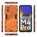For Xiaomi Poco M4 Pro 4G Punk Armor 2 in 1 PC + TPU Shockproof Phone Case with Invisible Holder(Orange)