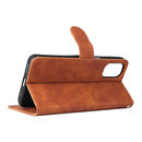 For Motorola Moto G22 Skin Feel Magnetic Buckle Calf Texture PU Phone Case(Brown)