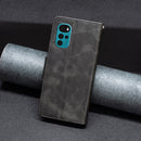 For Motorola Moto G22 Lambskin Texture Pure Color Leather Phone Case(Black)