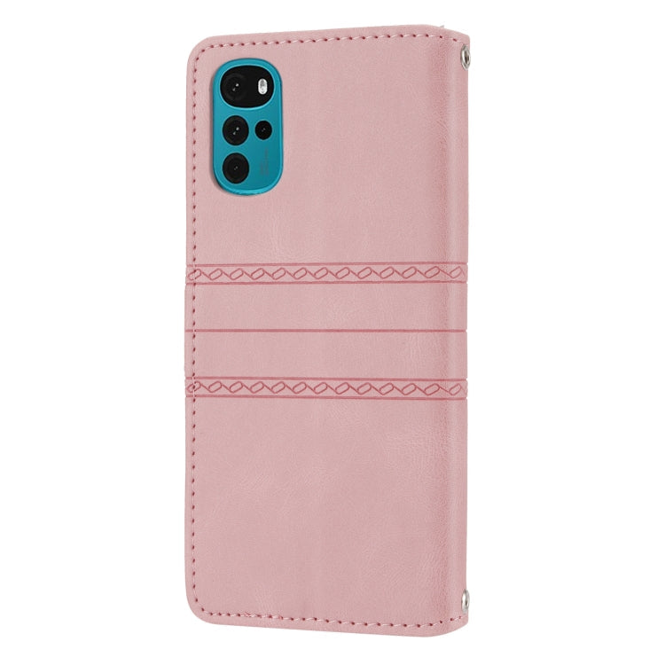 For Motorola Moto G22 Embossed Striped Magnetic Buckle Horizontal Flip Phone Leather Case(Pink)