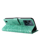 For OPPO Realme C31 4G 7-petal Flowers Embossed Flip Leather Phone Case(Green)