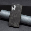 For Motorola Moto E32 4G / Moto E32s Lambskin Texture Pure Color Leather Phone Case(Black)