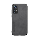 For Xiaomi 12 Pro Skin Feel Magnetic Leather Back Phone Case(Dark Grey)