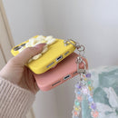 Four Flowers Hand Strap Phone Case For iPhone 14 Pro Max(Yellow)