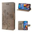 For Motorola Moto E32 Butterfly Flower Pattern Horizontal Flip Leather Phone Case with Card Slot & Holder(Grey)