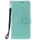 For iPhone 14 Pro Max Totem Flower Embossed Leather Case (Green)